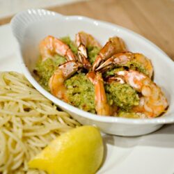 Succulent shrimp and crab in a lemon herb sauce served with spaghetti pasta.