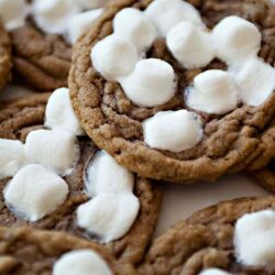 Sweet chocolate cookies topped with marshmallows, perfect for dessert or treats.