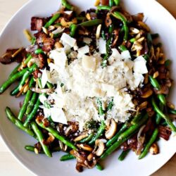 Crispy green bean mushroom saute with Parmesan cheese and bacon.
