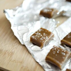 Rich caramel candies on aluminum foil, homemade caramel treats from Baked Bree.