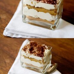 Creamy Tiramisu in a glass dessert cup with layers of coffee-soaked ladyfingers and mascarpone cheese.