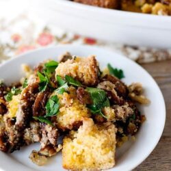 Savory mushroom and herb stuffing with bread cubes and fresh parsley. Perfect side dish for holiday dinners.