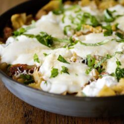 Crispy baked egg and cheese breakfast casserole with fresh herbs.