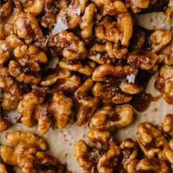 Candied spiced walnuts for slow cooker recipes and snacks. Perfect sweet and spicy nut recipe for fall or holiday gatherings.