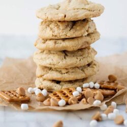 Soft, chewy cookies stacked with mini caramel candies, marshmallows, and graham crackers for a delicious treat.