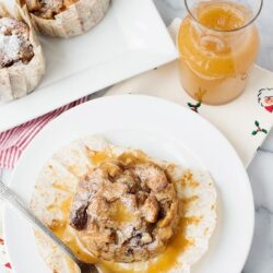 Butter bump cake with caramel sauce and apple filling on white plate, dessert, baked Bree.