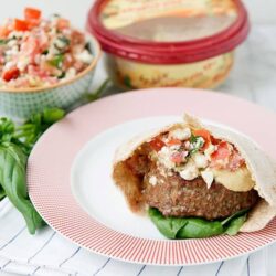 Savory meatloaf sandwich with vegetables and bread, baked Bree style.