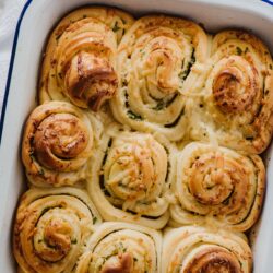 Golden baked cheese and herb swirls for savory appetizer or snack.