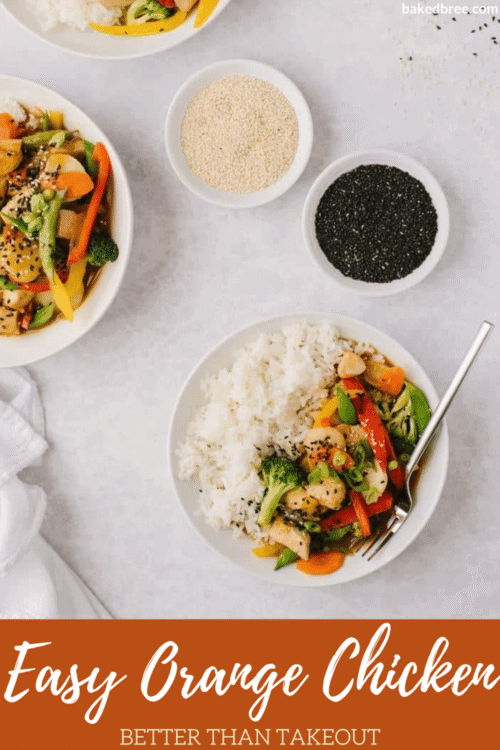 Steamed chicken with vegetables and rice on white plate, Asian-inspired meal, healthy dinner option.