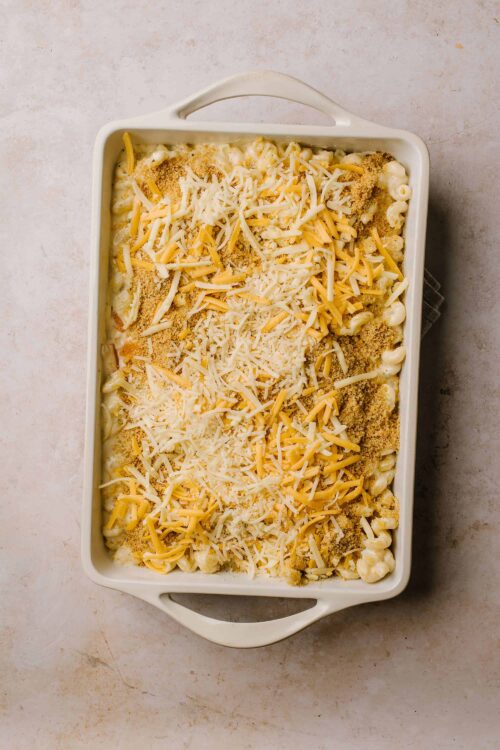 Creamy macaroni and cheese baked casserole with shredded cheese and breadcrumbs.