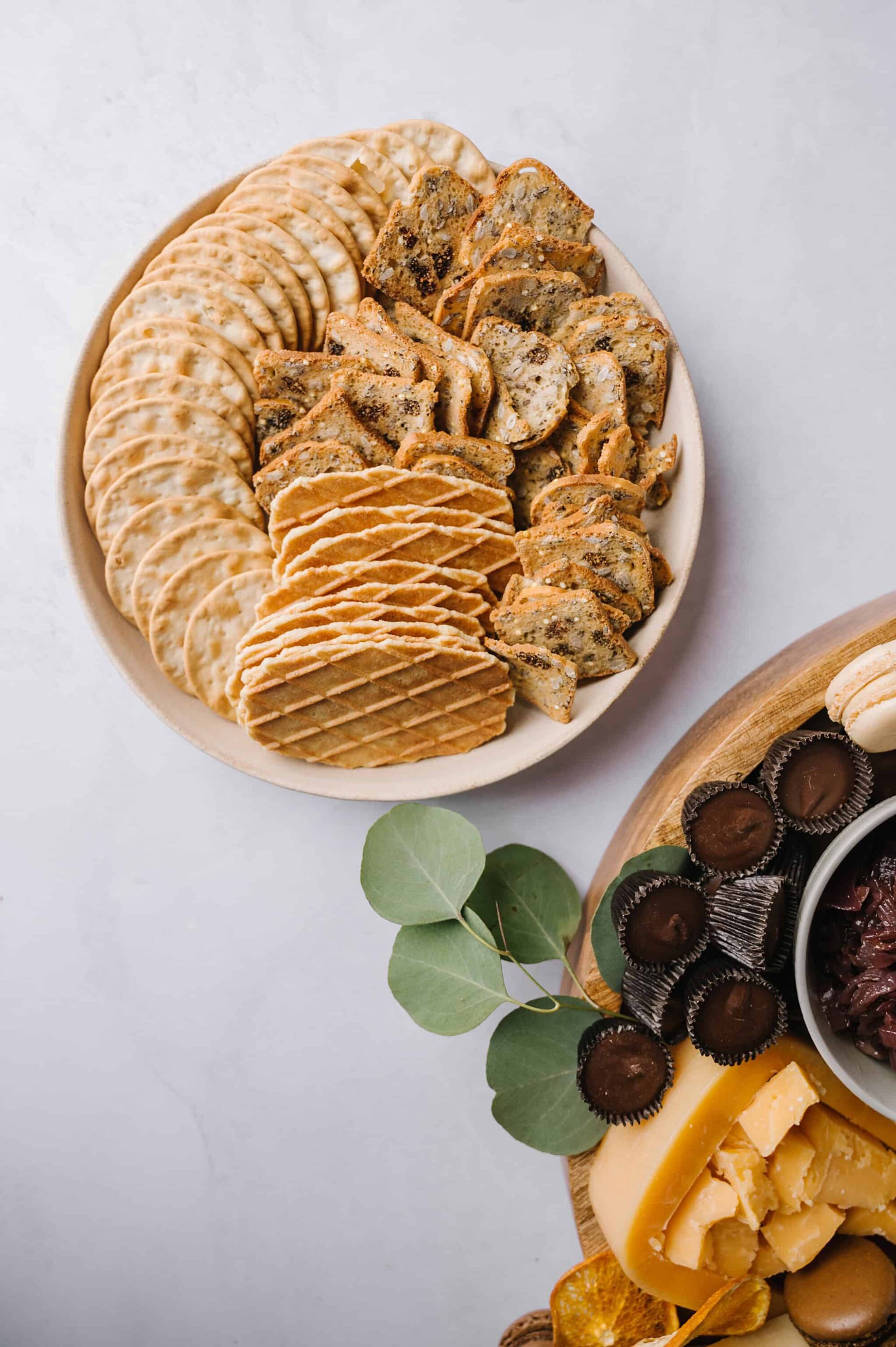 Crackers and cookies platter for entertaining or snacking, textured and delicious baked goods, perfect for charcuterie boards, cheese, and dessert pairings.