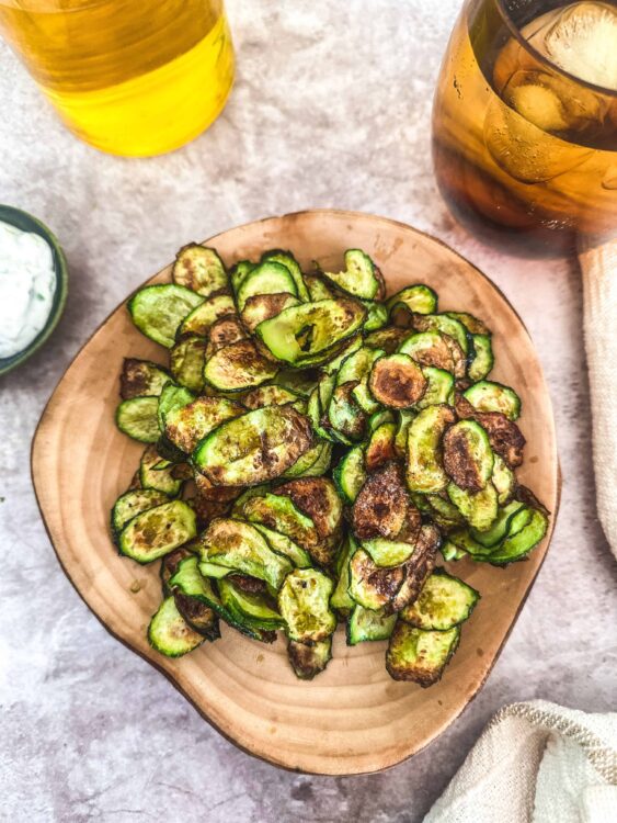 Crispy roasted cucumber slices served as a healthy snack or side dish. Perfect for summer gatherings and easy to prepare.
