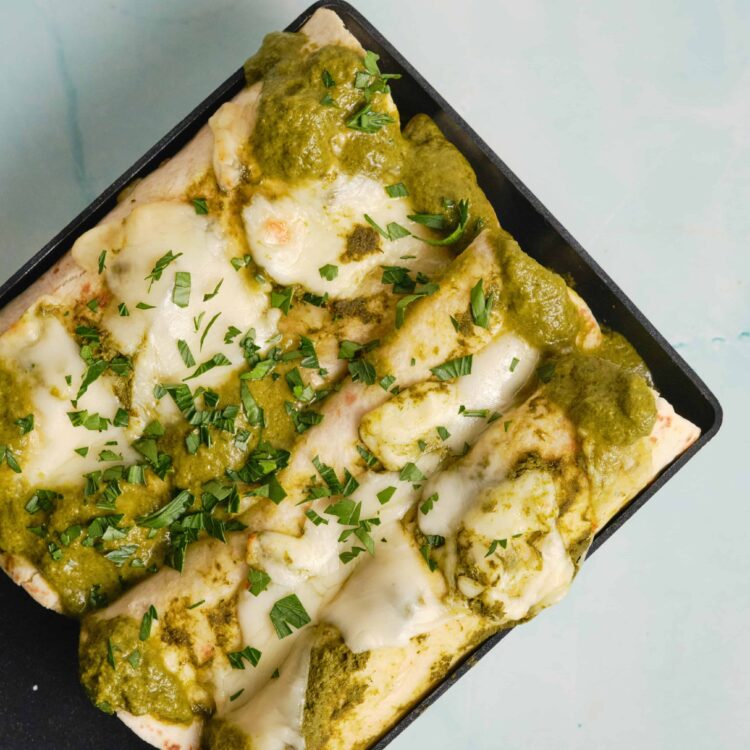 Crispy chicken parmesan with pesto and melted mozzarella cheese.