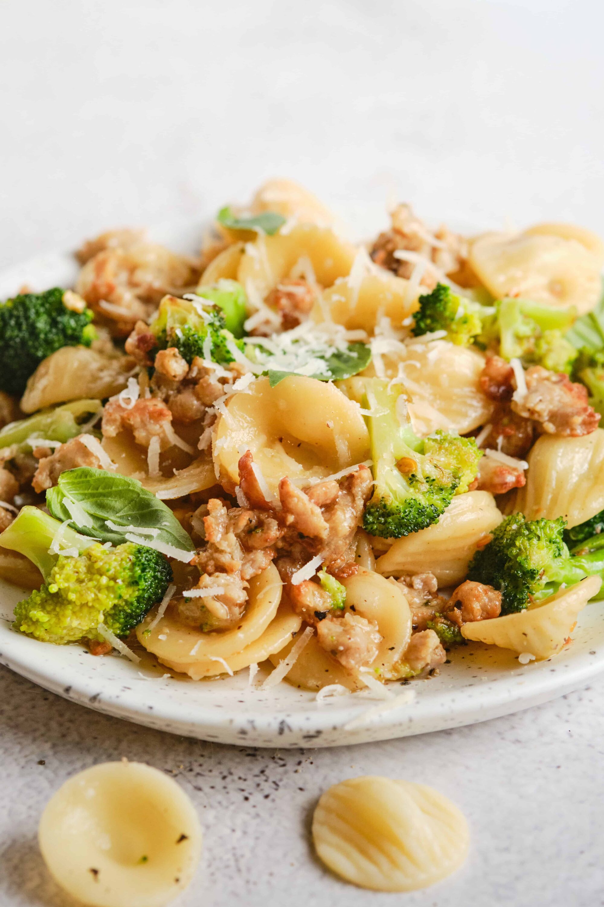 Creamy pasta with broccoli, sausage, and cheese, popular comfort food recipe.