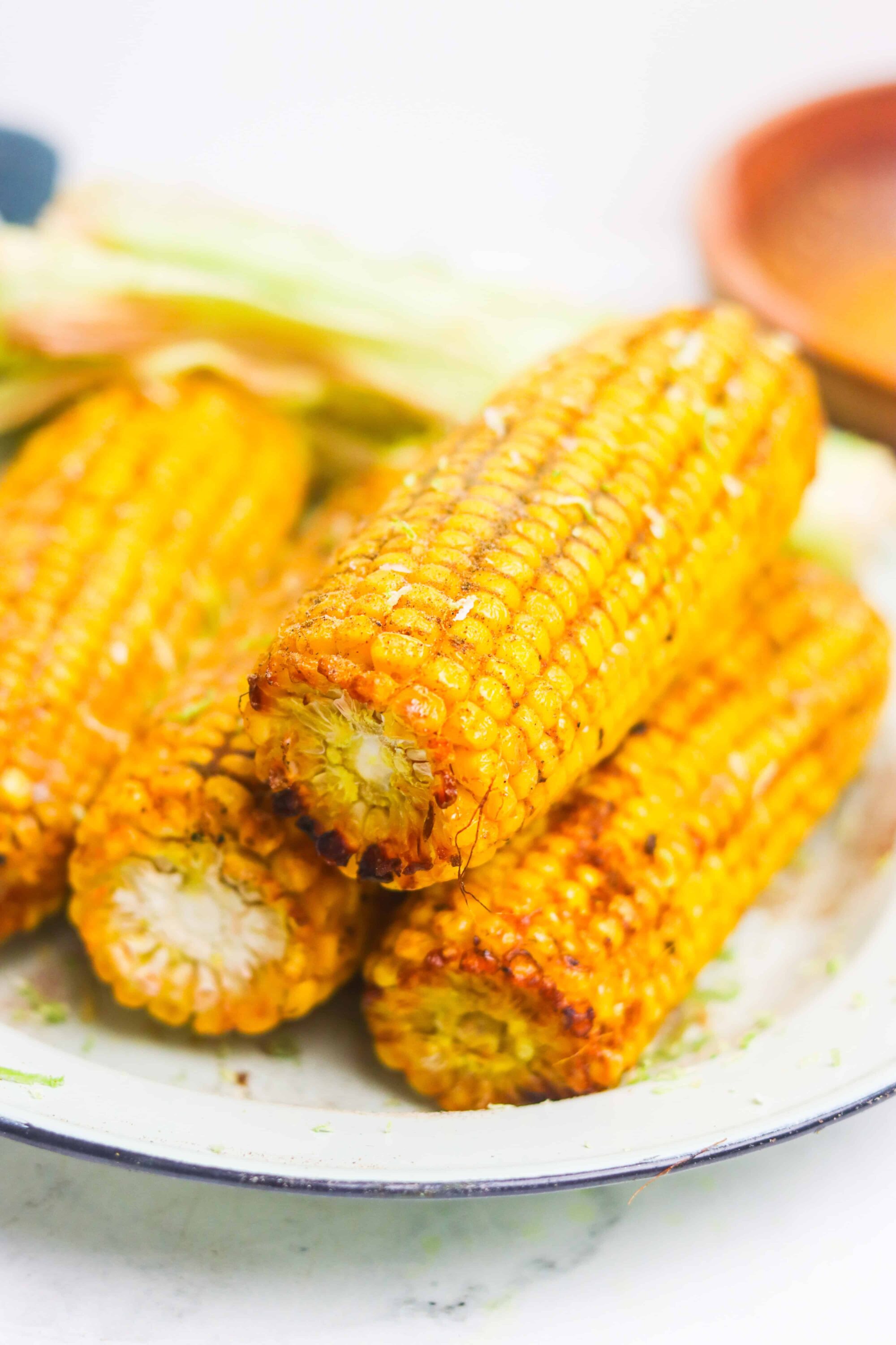 Fresh grilled corn on the cob with golden, charred kernels and a hint of spices. Perfect side dish for summer barbecues.