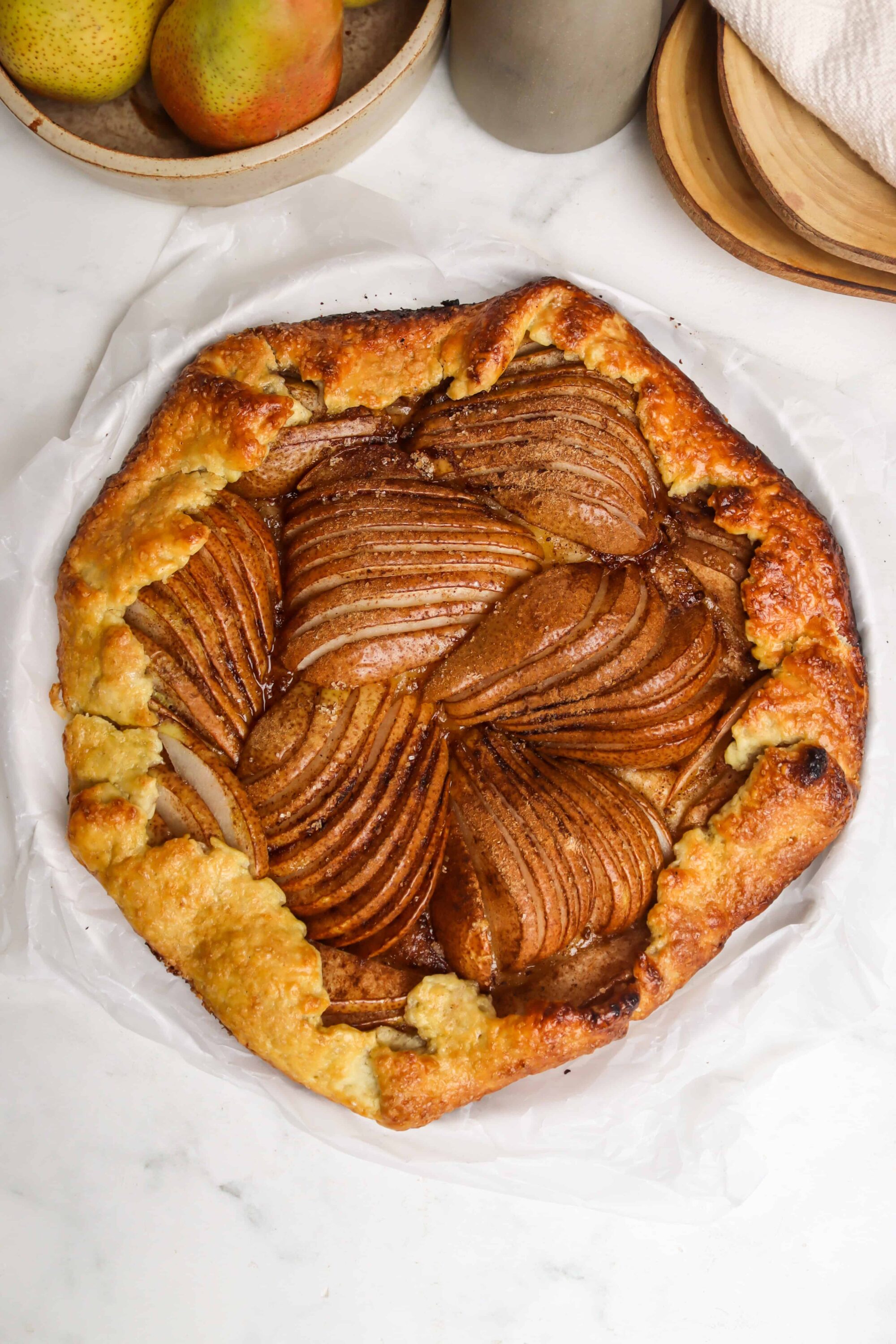 Fresh baked apple tarte tatin with caramelized apples and flaky pastry crust. Perfect for fall desserts.