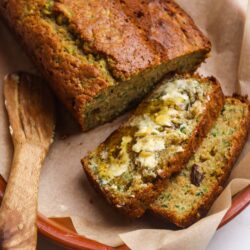 Moist zucchini bread with walnuts and chocolate chips, perfect for breakfast or a snack.