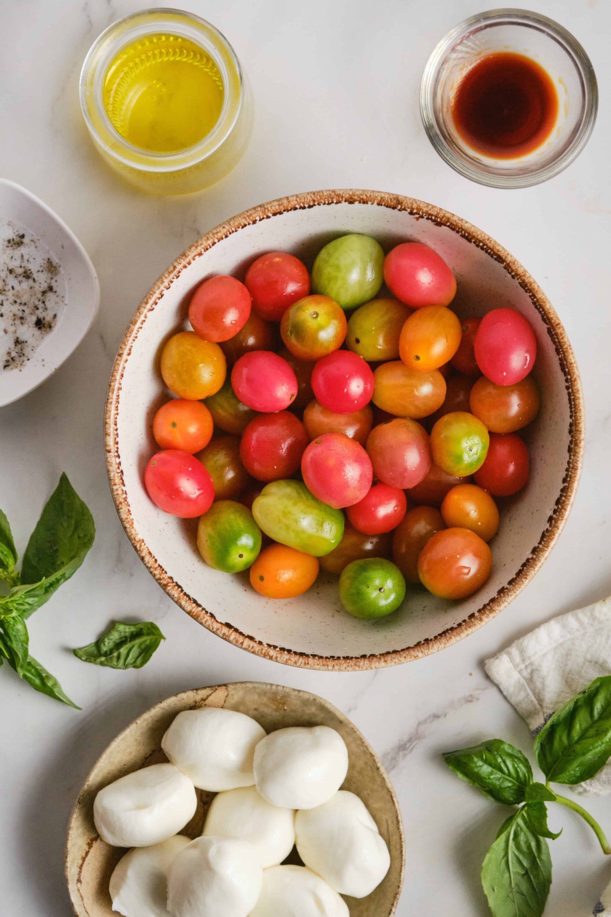 Fresh heirloom cherry tomatoes in various colors for homemade tomato salad or salsa.
