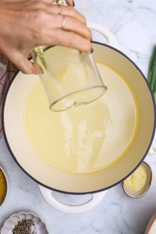 Fluffy yellow cake batter in a mixing bowl ready for baking.