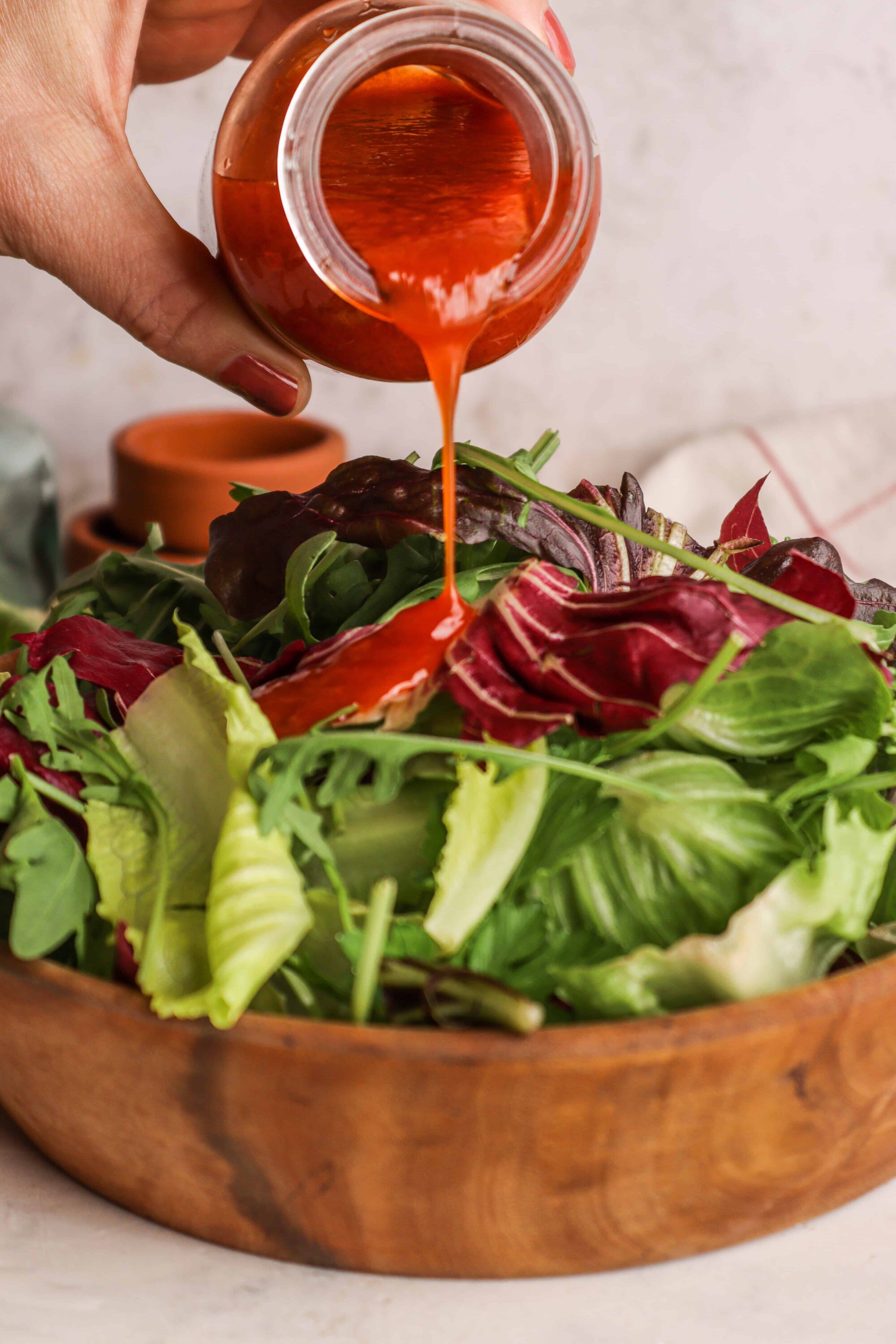 Fresh mixed greens salad with balsamic vinaigrette dressing, healthy and vibrant everyday meal.