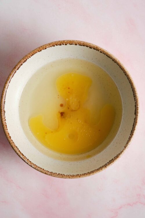 Buttermilk in a rustic ceramic bowl, ready for baking or cooking recipes.