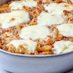 Creamy baked pasta casserole with melted cheese and rich tomato sauce. Perfect comfort food for family dinner.
