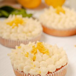 Lemon and white chocolate cupcake with white chocolate chips and lemon zest topping.