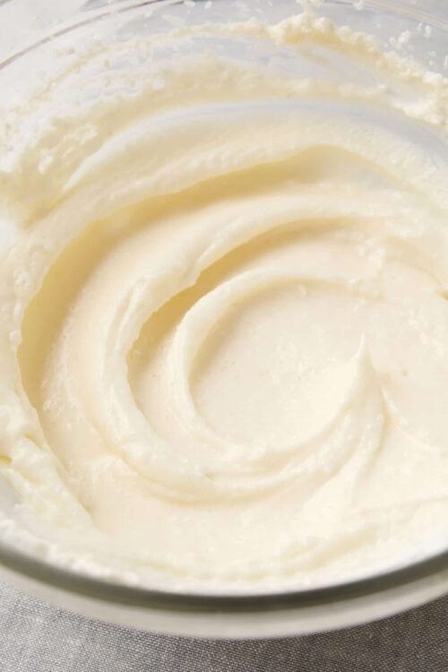 Cream cheese frosting with smooth, fluffy texture for baking and desserts.