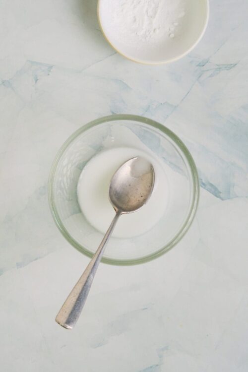 Flour and milk mixture for baking in glass bowls, baking ingredients, baking preparation, home baking, vanilla milk mixture.