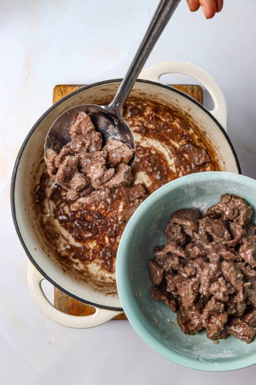 Savory beef stew cooking in a pot.