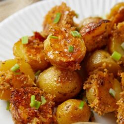 Savory roasted baby potatoes with crispy seasoning and green onions.