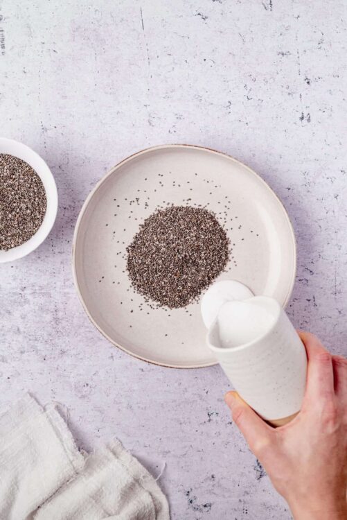 FileName: chia-seeds-in-white-bowl-and-ceramic-mug-on-textured-background.jpg.