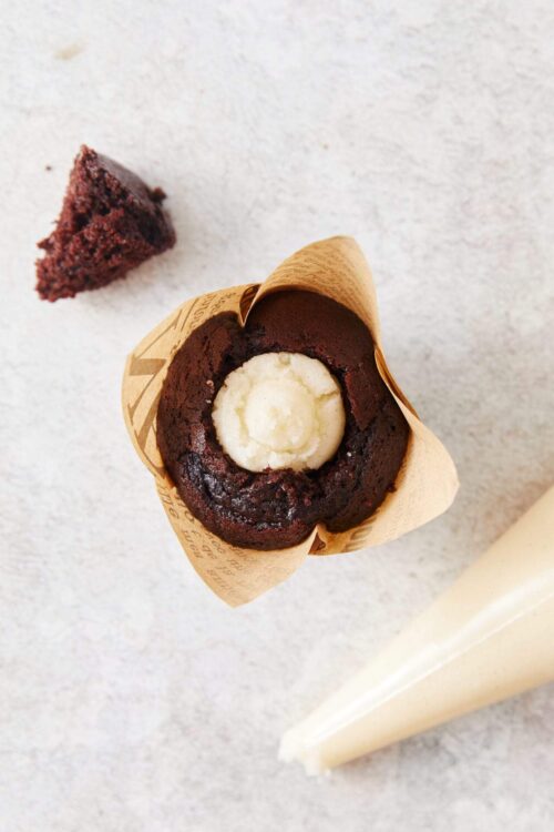 Rich chocolate lava cake with melting center and parchment wrapper, perfect for dessert.