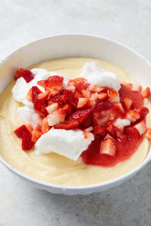 Fresh vanilla pudding topped with strawberries, whipped cream, and strawberry sauce. Perfect for summer desserts and easy to make at home.