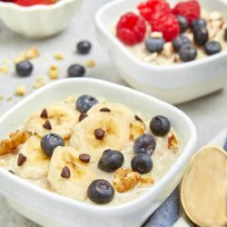 Fresh banana and blueberry oatmeal with walnuts and chocolate chips.