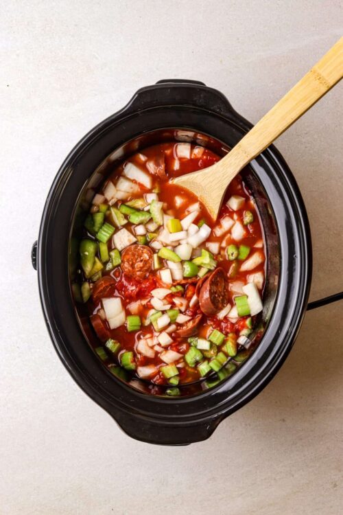 Savory slow cooker chili with sausage, vegetables, and tomato sauce in an instant pot.