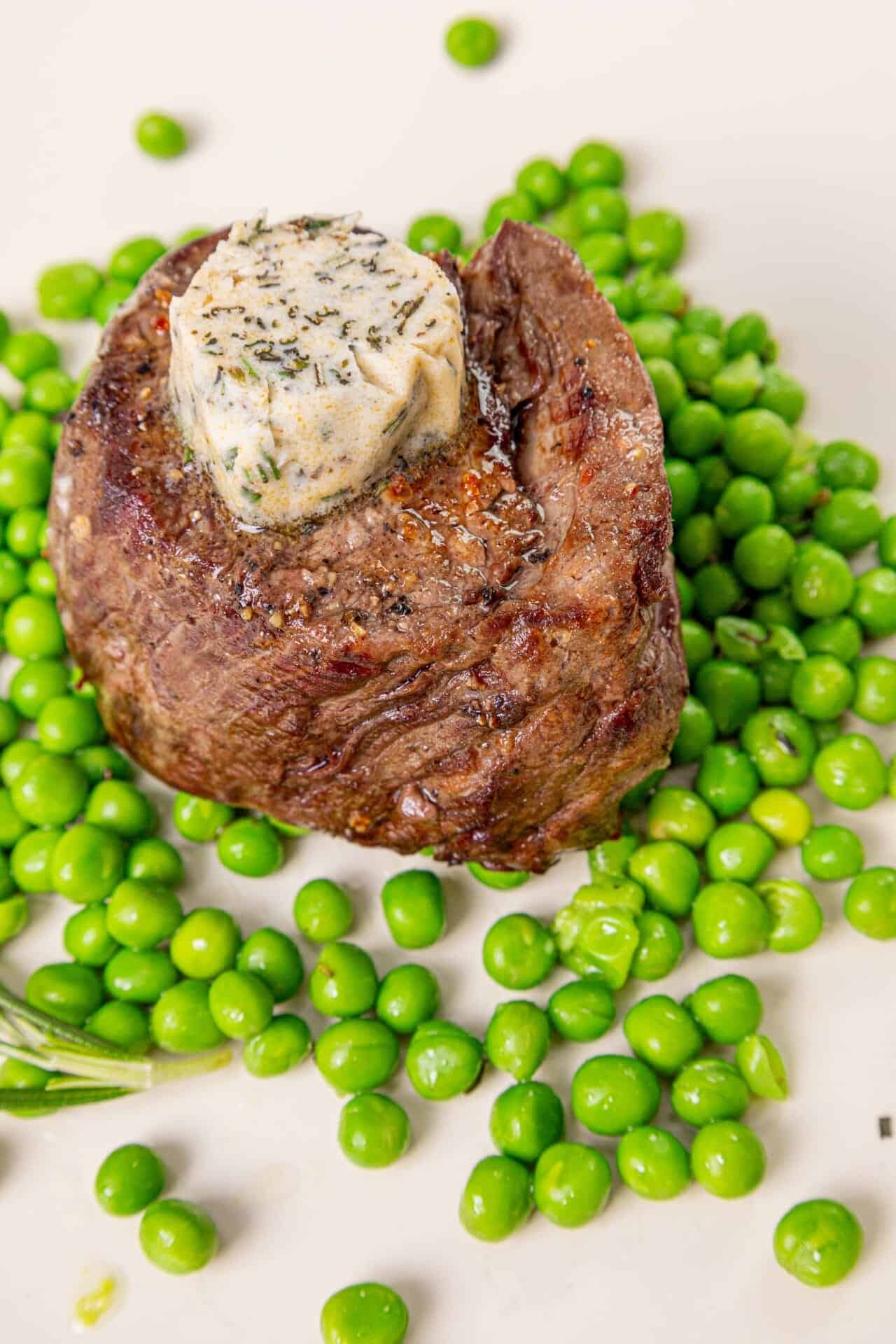 Juicy roasted beef tenderloin with herb butter topped.