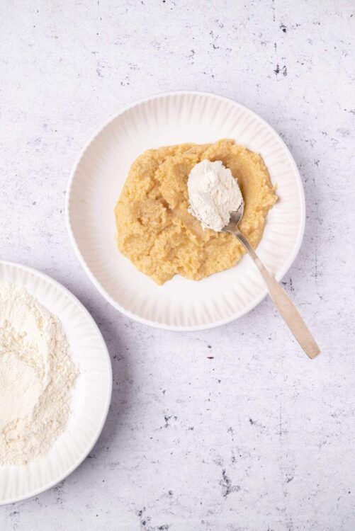 Butter and flour for baking on white plates, ingredients for pastry dough on a textured surface, Baked Bree culinary blog, baking essentials for homemade pastry, relevant for baking and pastry recipes.