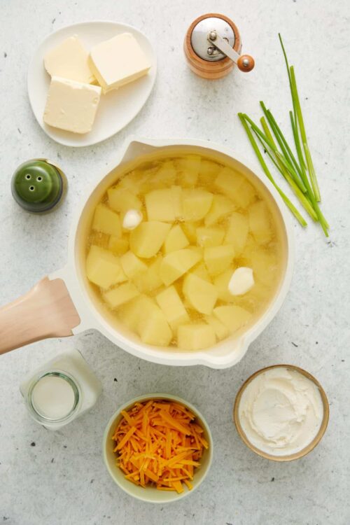 Butternut squash in a saucepan for creamy soup recipe.