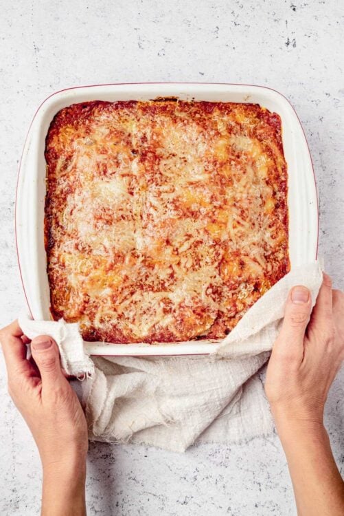 Cheesy baked lasagna casserole with golden bubbling cheese on top.