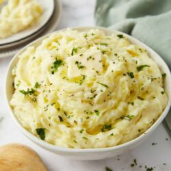 Creamy mashed potatoes with butter, herbs, and a smooth, fluffy texture. Perfect comfort food for any meal.