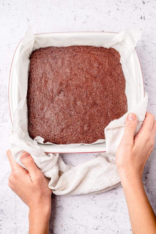 Rich chocolate brownie fresh out of the oven in a baking dish.