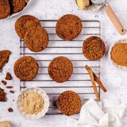 Buttermilk oatmeal cookies on cooling rack, baked bree, dessert baking, cinnamon cookies, homemade cookies, cozy dessert, sweet treats.