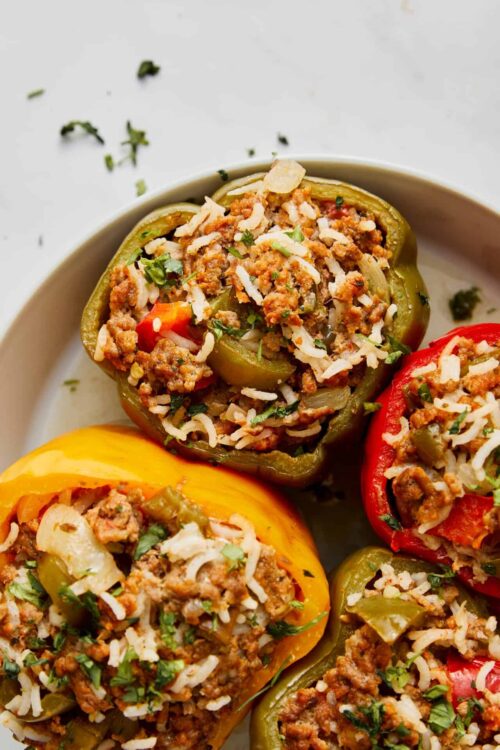 Stuffed bell peppers with ground meat and rice filling.