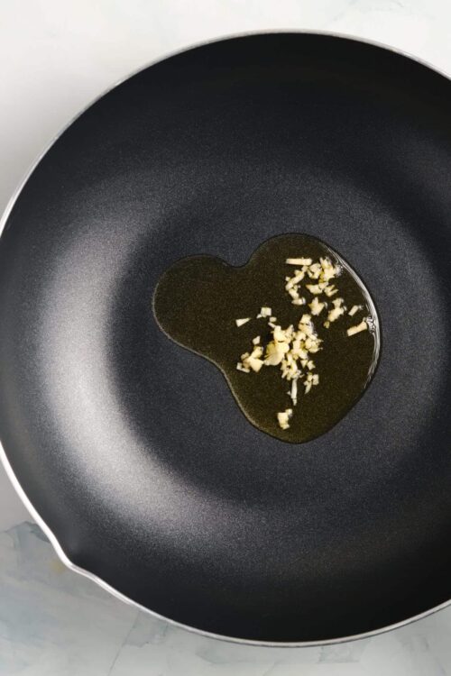 Minced garlic in olive oil in a non-stick skillet.