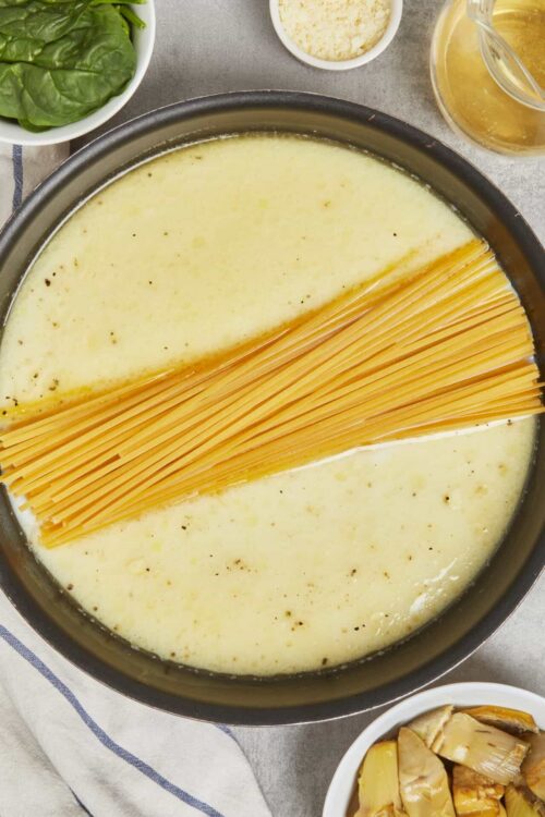 Creamy cheese and pasta recipe with spaghetti in a cheese sauce. Perfect comfort food dish for family dinner or special occasions.