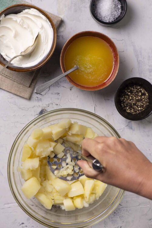 Cream cheese, butter, salt, and spices for baking recipes or cooking.