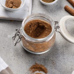 Ground cinnamon in glass jar, baking spices, baking ingredients, baking tips, Baked Bree.