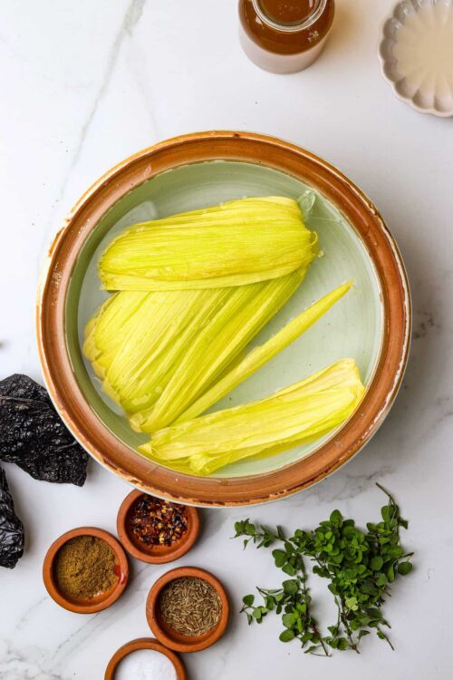 Fresh cut celery soaking in water for cooking or baking.