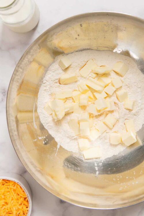 Cream and butter in mixing bowl for baking recipes.